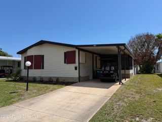 706 Hyacinth Circle, Barefoot Bay, FL 32976