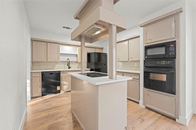 19415 Enchanted Oaks Drive, Spring, TX 77388