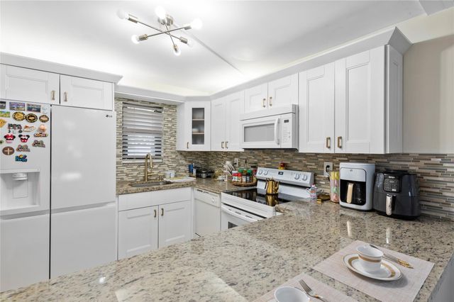 9300 SW 8th Street 102, Boca Raton, FL 33428
