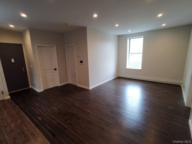 87-16 Britton Avenue, Elmhurst, NY 11373