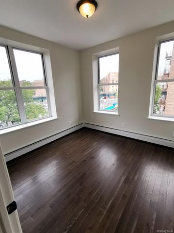 87-16 Britton Avenue, Elmhurst, NY 11373