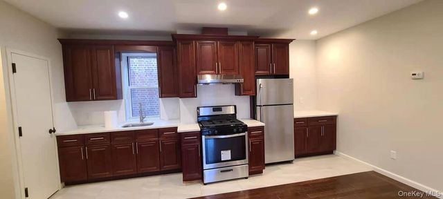 87-16 Britton Avenue, Elmhurst, NY 11373
