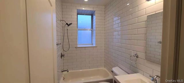 87-16 Britton Avenue, Elmhurst, NY 11373