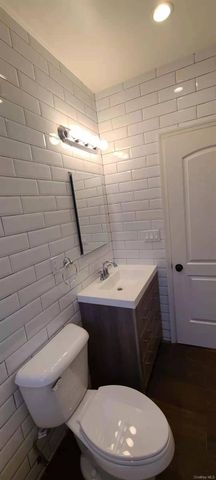 87-16 Britton Avenue, Elmhurst, NY 11373