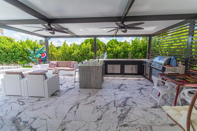 11804 Osprey Pointe Circle, Wellington, FL 33449