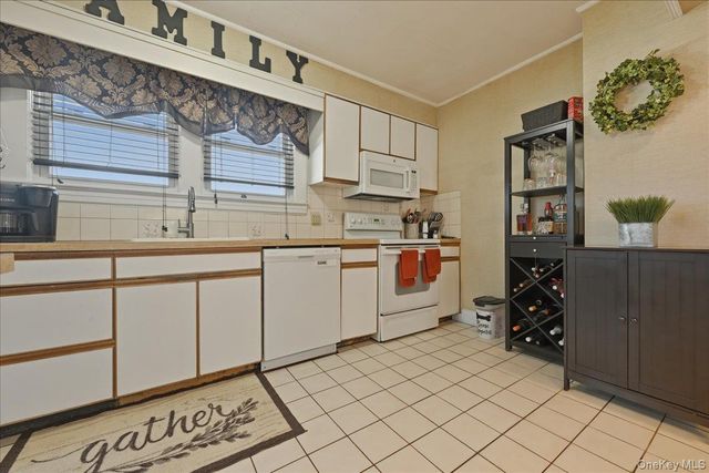 1165 Meadowbrook Road, Merrick, NY 11566