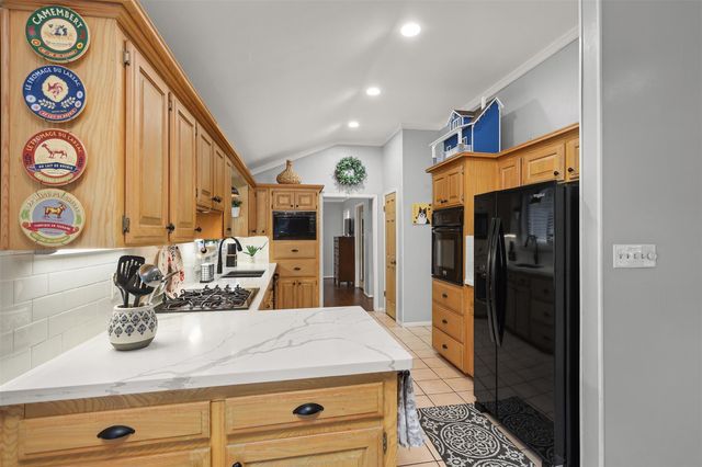 115 Bayou Glen Street, Hitchcock, TX 77563