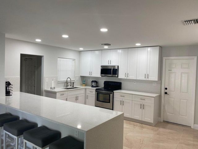 1831 EAST Court, Lake Clarke Shores, FL 33406