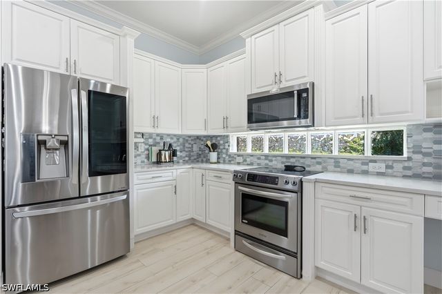 1394 King Sago CT, Naples, FL 34119