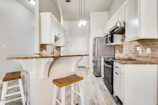 205 Quiet Bluff Drive, Youngsville, LA 70592