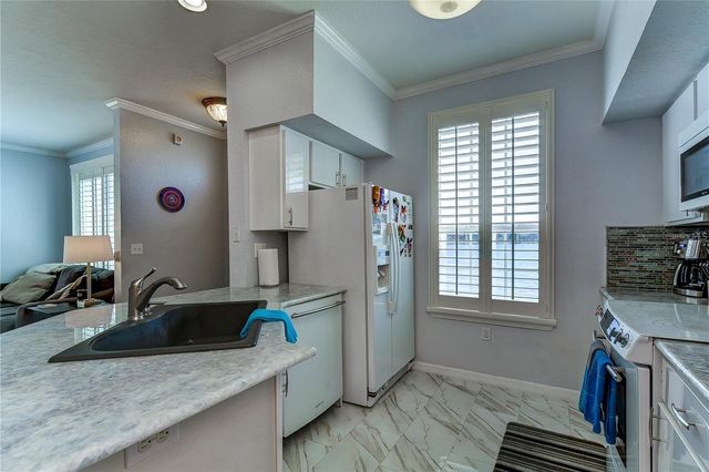 9034 LAKE CHASE ISLAND WAY 9034, Tampa, FL 33626
