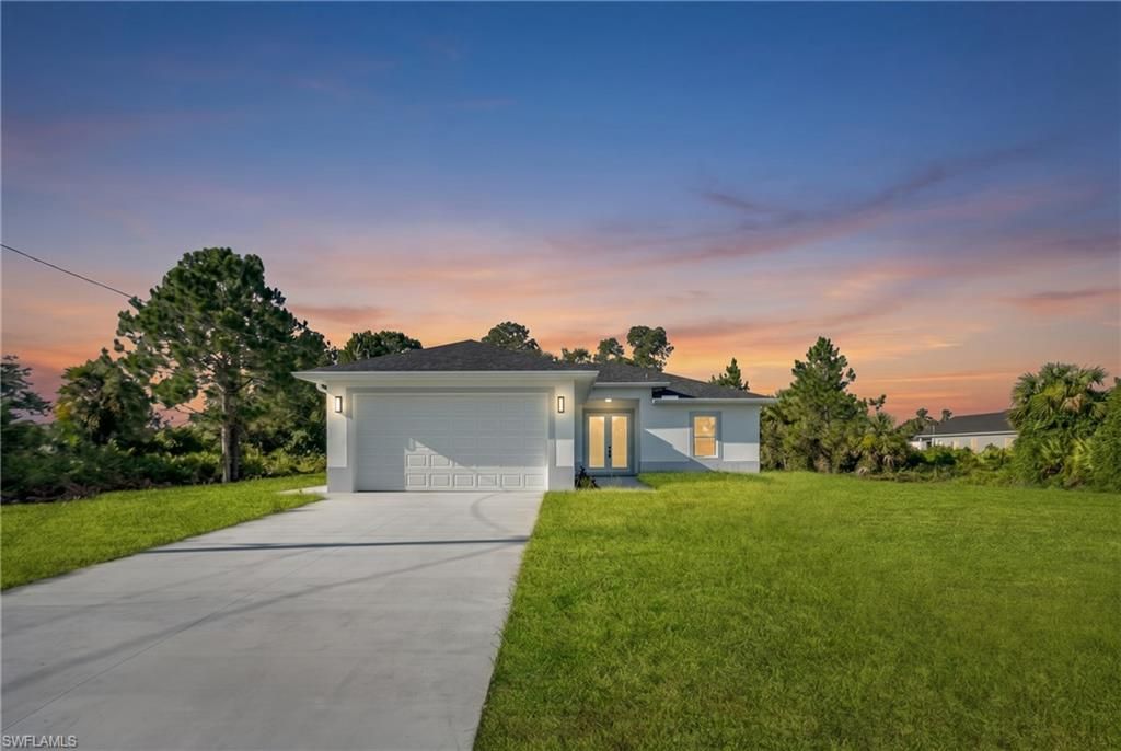 864 Chantilly ST E, LEHIGH ACRES, FL 33974 — exterior