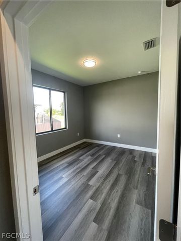 610 FLOYD AVE S, Lehigh Acres, FL 33976