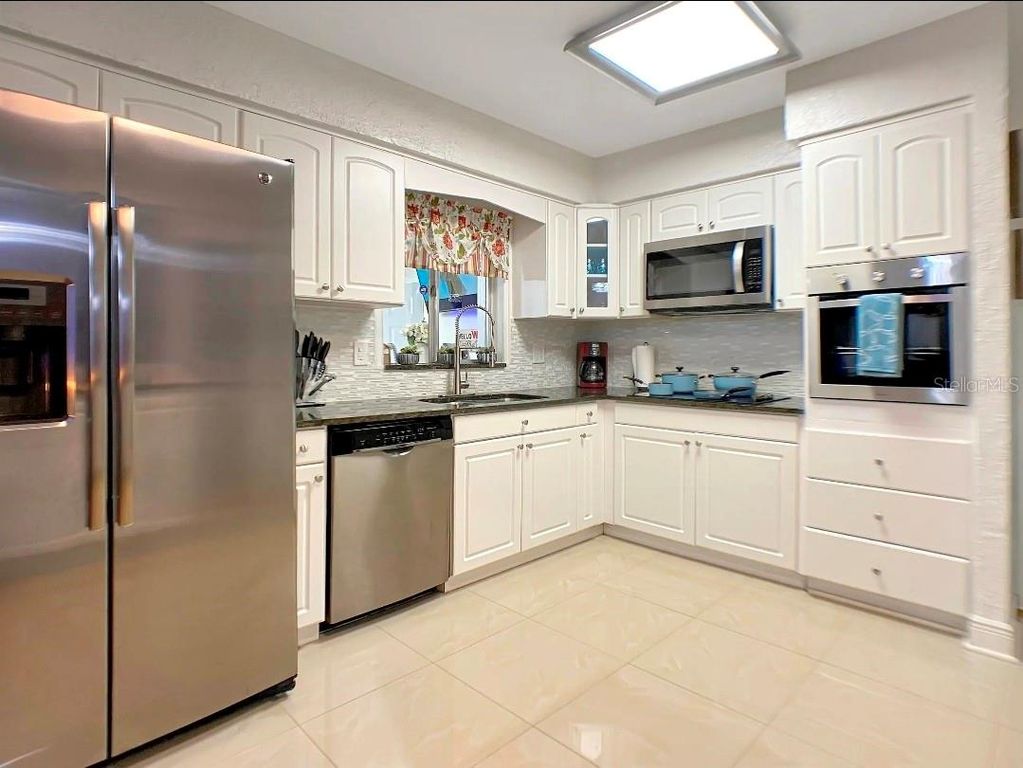 Image 12 of property listing at 7907 W HIAWATHA STREET, Tampa, FL 33615