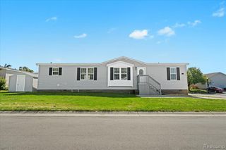 11045 Woodland Ridge Court, South Lyon, MI 48178