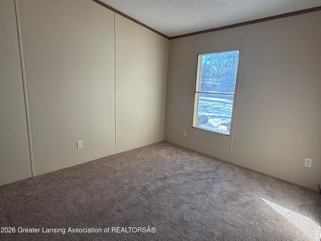 6815 Aurelius Road, Lansing, MI 48911