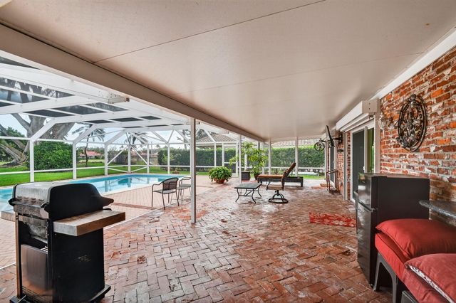 224 Orange Tree Drive, Atlantis, FL 33462