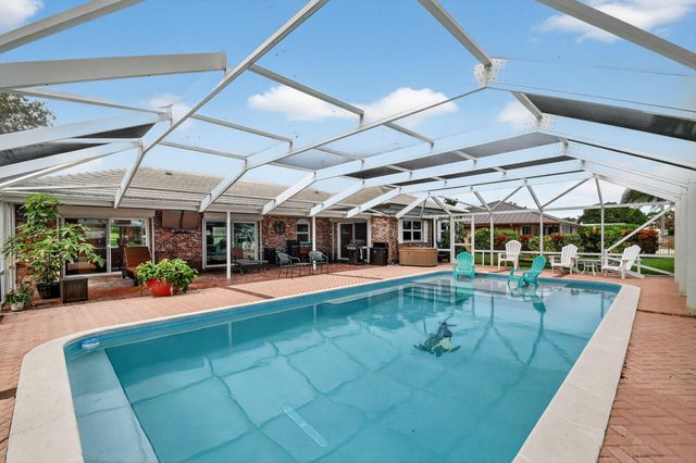 224 Orange Tree Drive, Atlantis, FL 33462