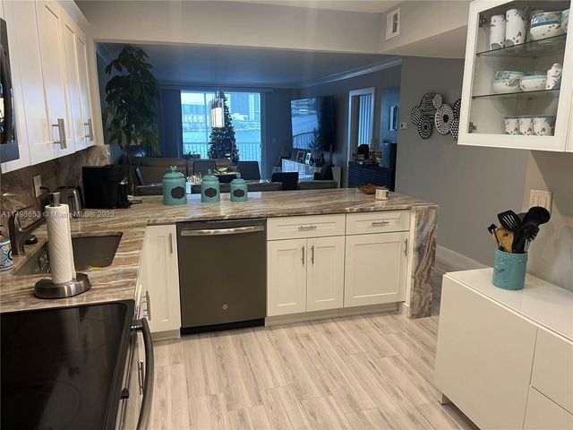 410 Golden Isles Dr 202, Hallandale Beach, FL 33009