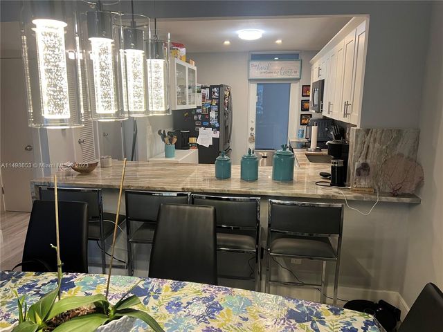 410 Golden Isles Dr 202, Hallandale Beach, FL 33009