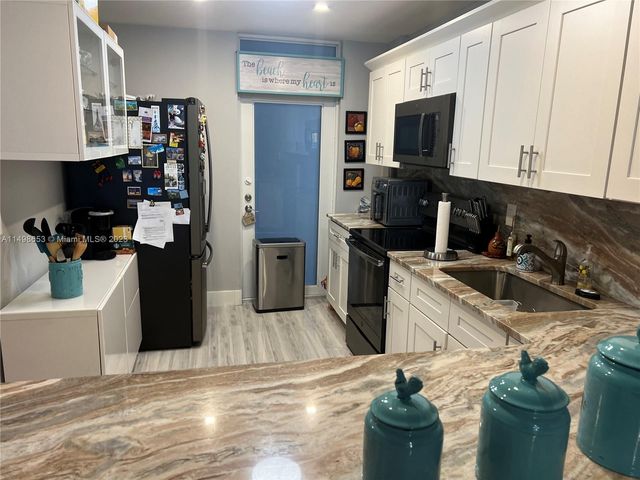 410 Golden Isles Dr 202, Hallandale Beach, FL 33009