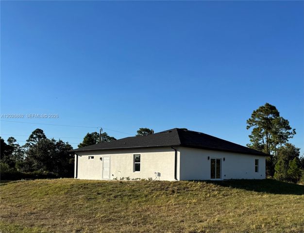 713 DA VINCI AVE S, Lehigh Acres, FL 33974