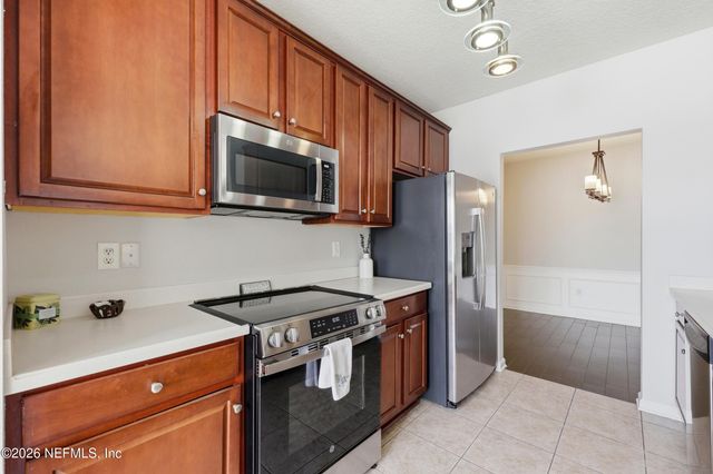 6650 WHITE BLOSSOM Circle 32C, Jacksonville, FL 32258