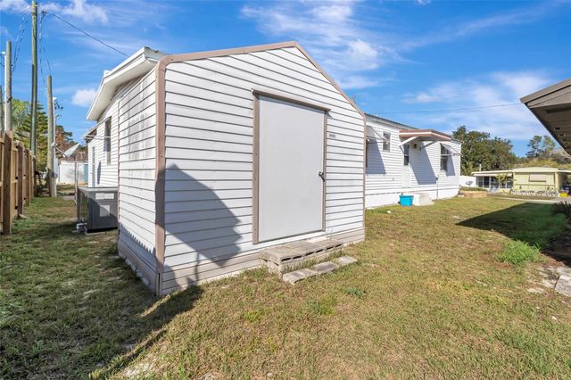 1409 RIDGE ROAD, Tavares, FL 32778