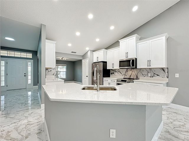 697 WINDING LAKE DRIVE, Clermont, FL 34711