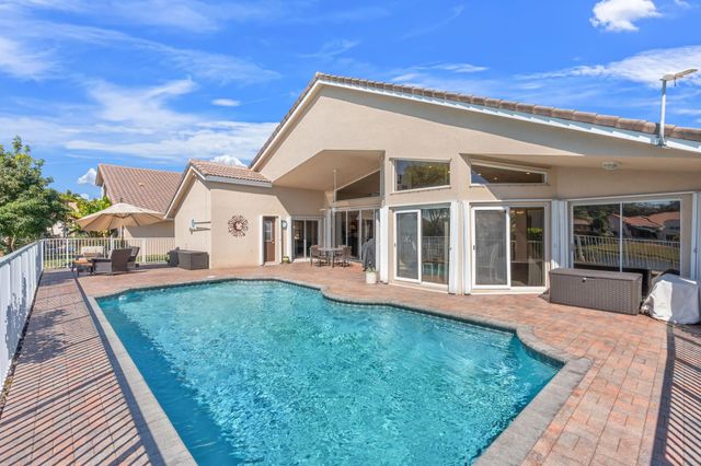 9938 N Springs Way, Coral Springs, FL 33076