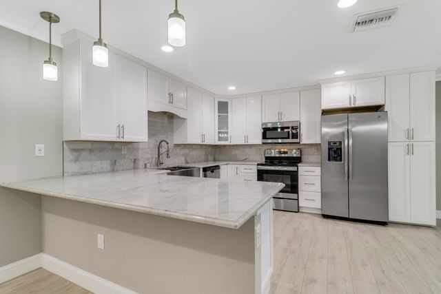 9713 SW Santa Monica Drive, Palm City, FL 34990