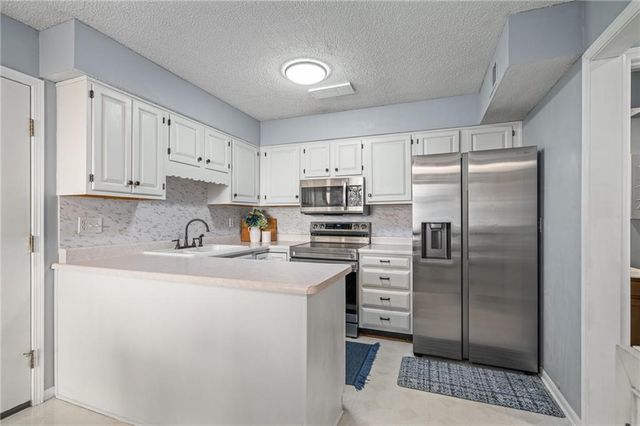 12024 Goodman Street, Overland Park, KS 66213