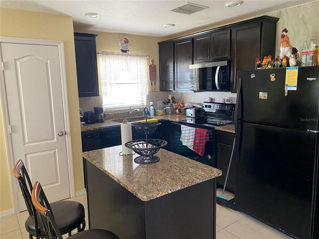 1919 AMBER SWEET CIRCLE, Dundee, FL 33838