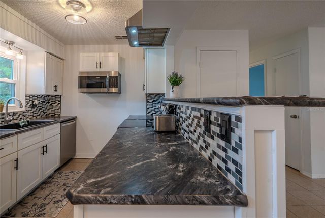 1049 BIRCH BOULEVARD, Tavares, FL 32778