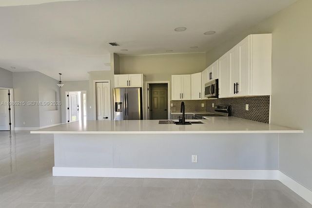 116 Ridgemont Drive, Lehigh Acres, FL 33972