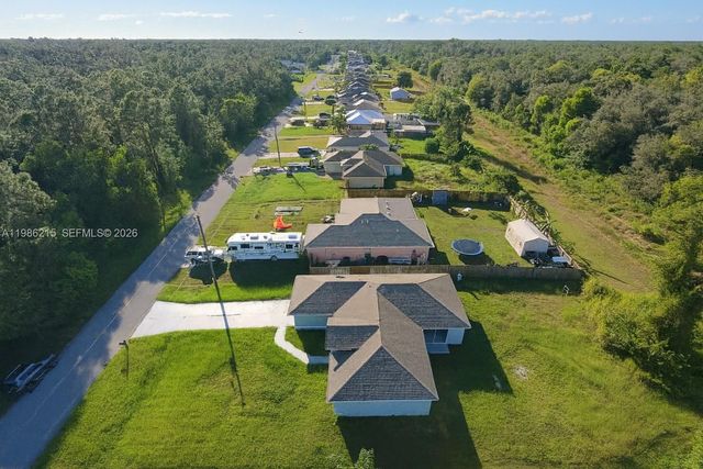 116 Ridgemont Drive, Lehigh Acres, FL 33972