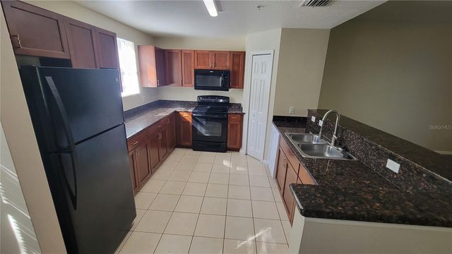 6054 GIBSON AVENUE, Tampa, FL 33617