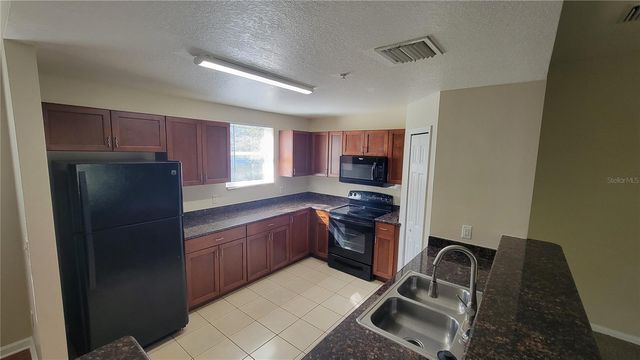 6054 GIBSON AVENUE, Tampa, FL 33617