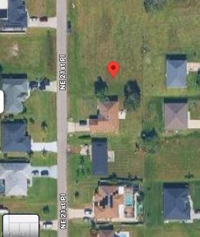 Image 2 of property listing at 1415 NE 21st PL, Cape Coral, FL 33909