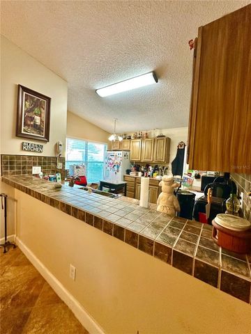 11117 HUXLEY AVENUE, Orlando, FL 32837