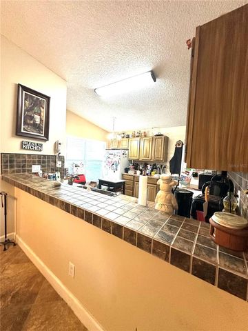 11117 HUXLEY AVENUE, Orlando, FL 32837