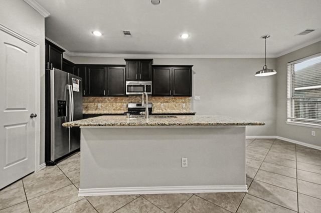 2502 Flowing Palm Lane, Fresno, TX 77545