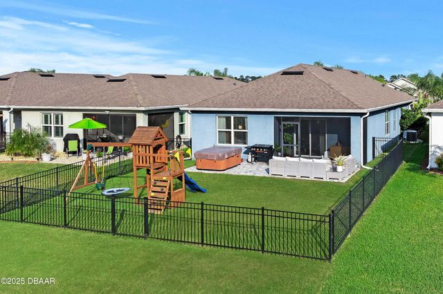 214 Caryota Court, New Smyrna Beach, FL 32168