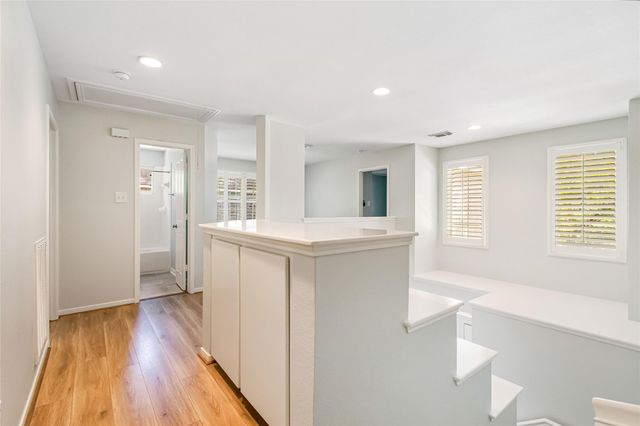 77 Sugar Grove Court, The Woodlands, TX 77382