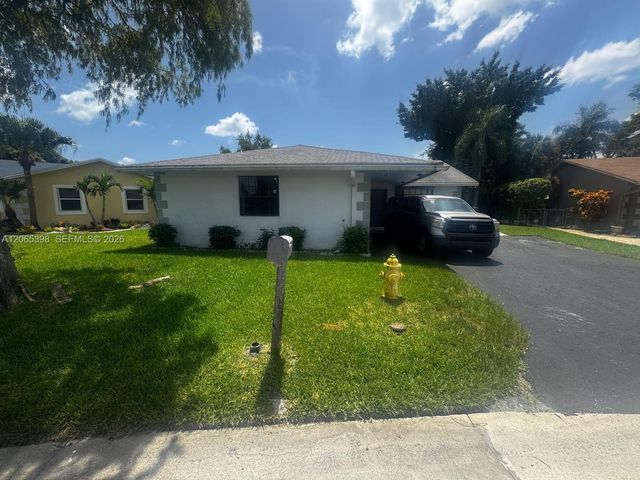 8848 NW 76th Court, Tamarac, FL 33321