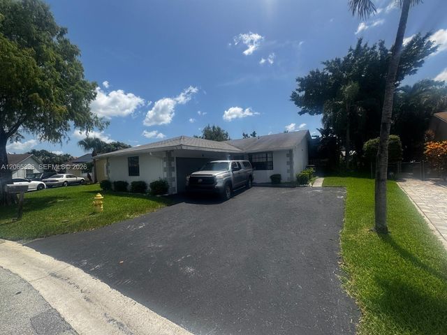 8848 NW 76th Court, Tamarac, FL 33321