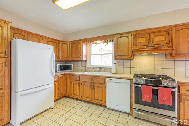 457 W Rosewood, East Alton, IL 62024