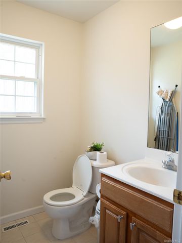 49 S Cozine Road, Center Moriches, NY 11934