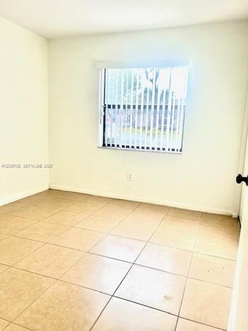 871 NE 207th Ter 4-101, Miami, FL 33179