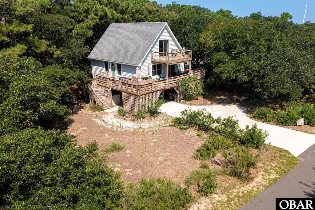 Image 1 of property listing at 115 Clam Shell Trail, Southern Shores, NC 27949